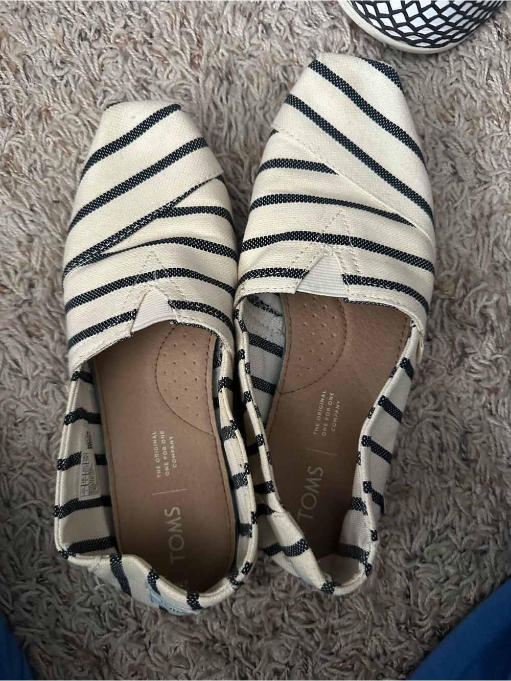 TOMS Cream Canvas Slip-Ons with Navy Stripes